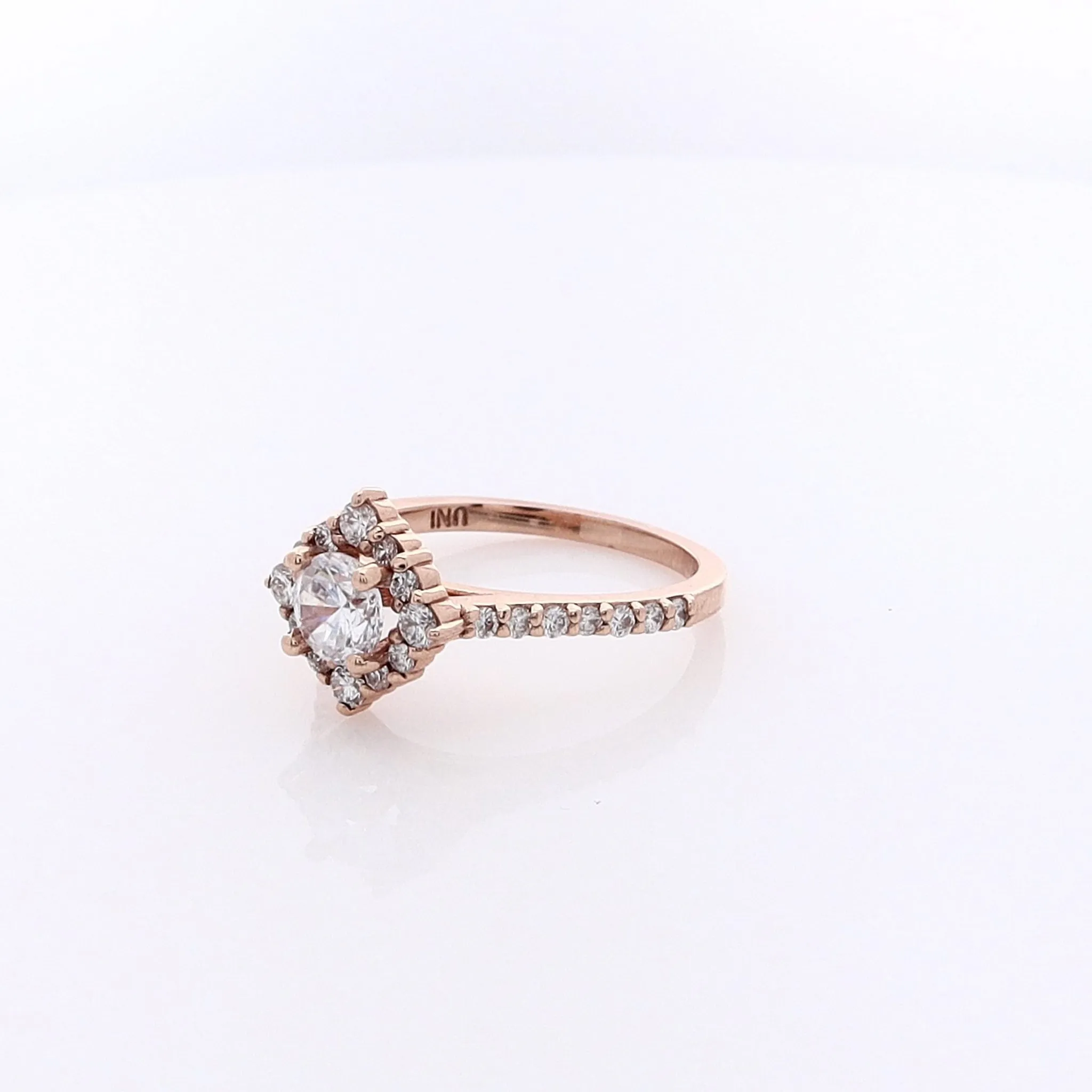 14 Karat Rose Gold Semi Pave Diamond Engagement Ring